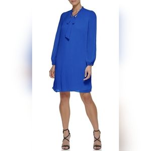 DKNY blue pleated dress with a neck tie and bell sleeves 14